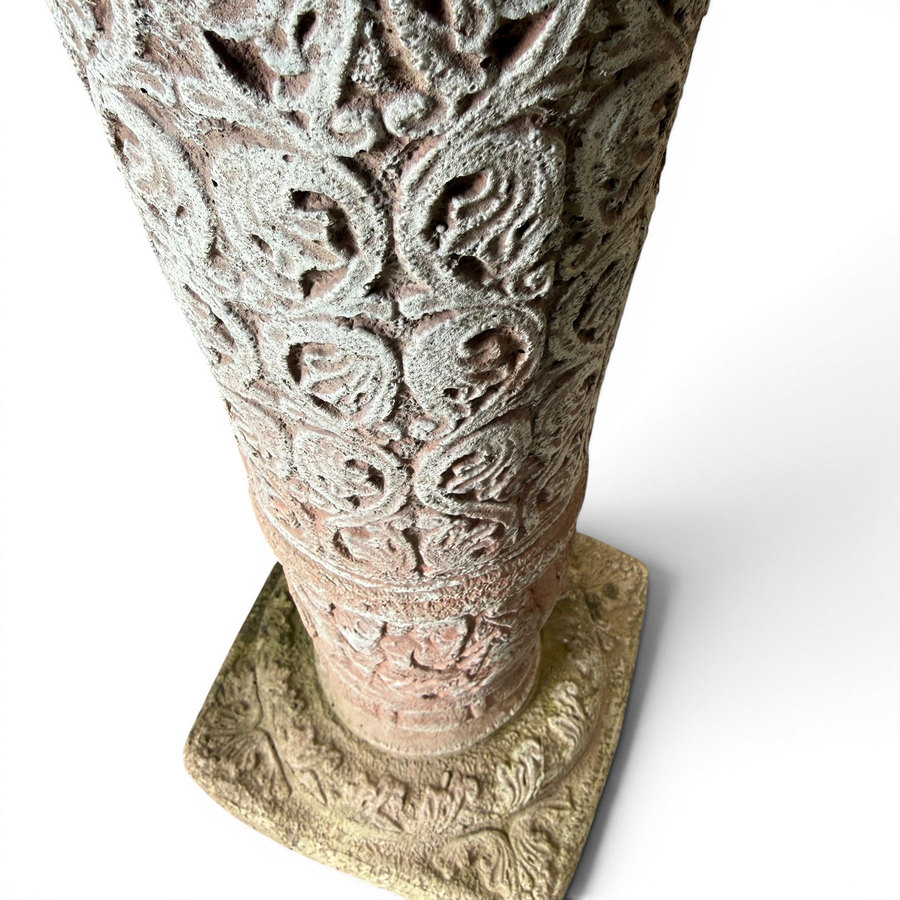 Weathered cast stone sundial, shaped top with metal dial, patterned column