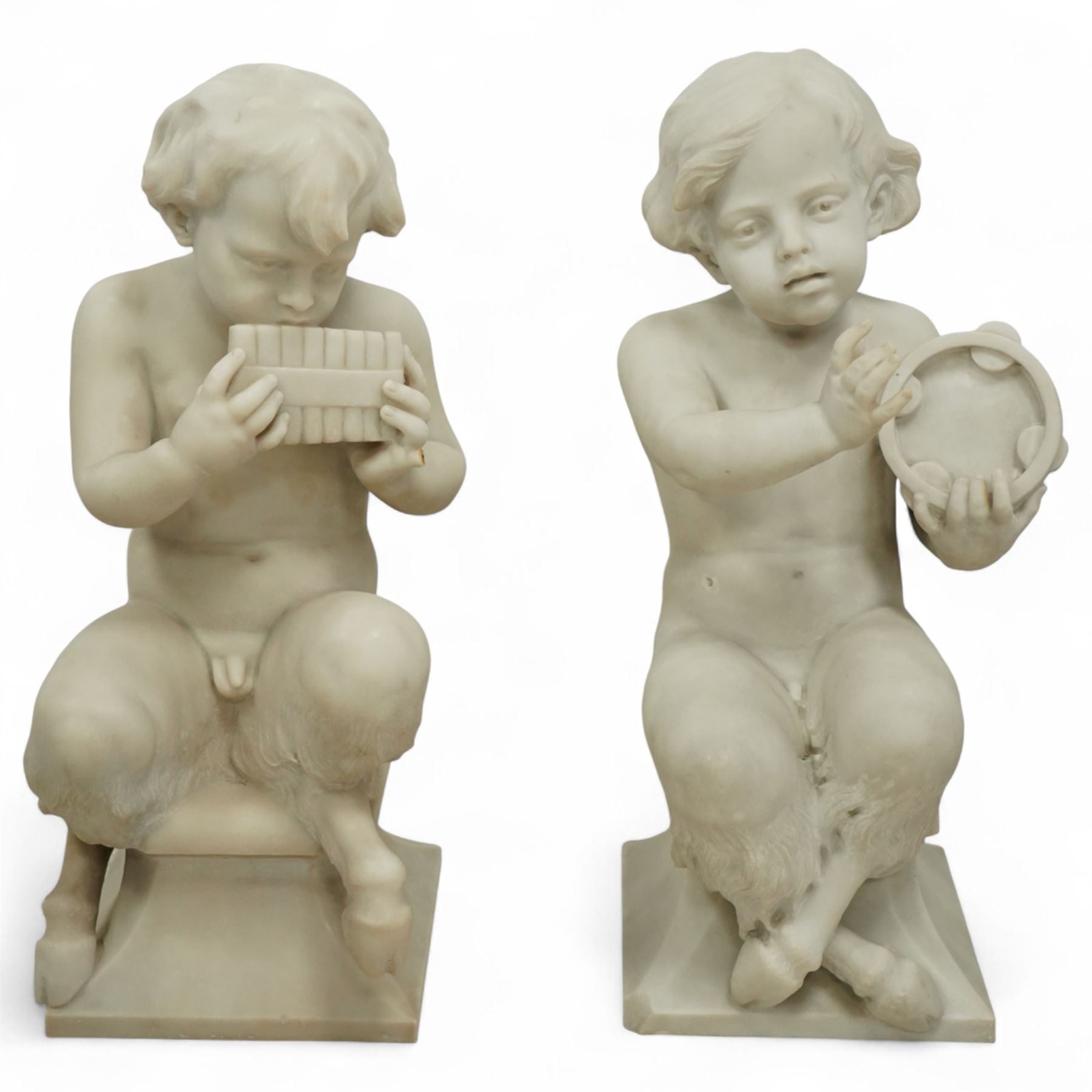 Follower of Claude Michel Clodion (French 1738-1814): The Putti-Faun Orchestra - set of four Italian carved white marble figures of child satyrs as musicians, each finely carved figure depicting a seated putto-faun with youthful features and small goat’s legs and cloven feet, variously playing rustic instruments: a syrinx (Panpipes), a flute, a tambourine and clappers - each raised on an integral waisted square plinth, Italian, circa 1900

Provenance: Kirkham Hall

Notes: Inspired by the rustic god Pan and his followers, these putti-fauns reflect the late-19th-century revival of classical themes popular with Grand Tour collectors; their instruments evoke the god Pan’s pastoral music, while the carving and  composition exemplify the appeal of bacchic subjects in the Italian neoclassical tradition