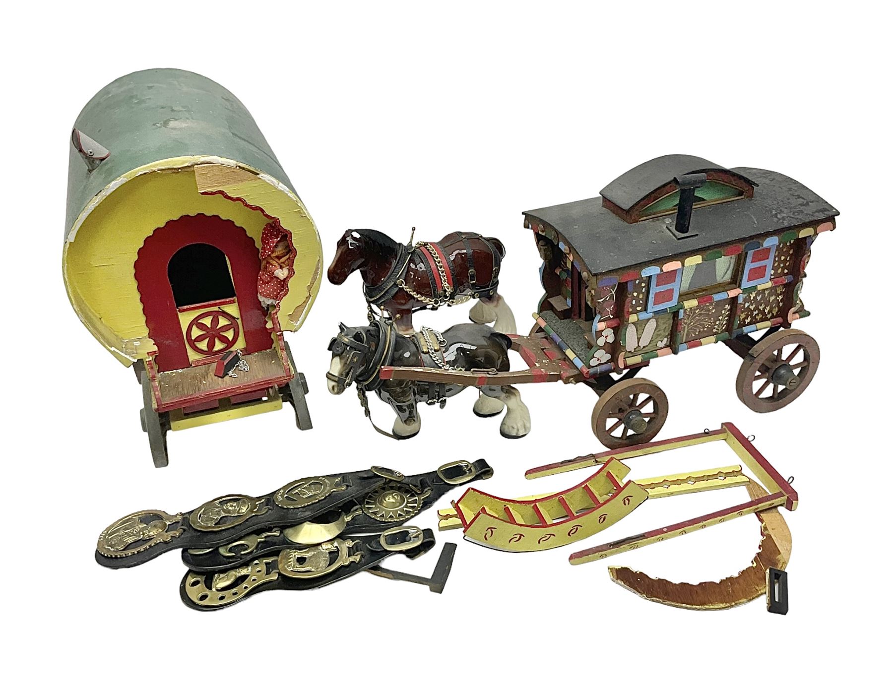 Two ceramic shire horse and gypsy caravans, together with horse brasses 