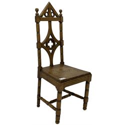 19th century Gothic elm chair, pointed cresting rail over shaped back with central quatrefoil roundel, on turned supports united by turned H-stretchers 