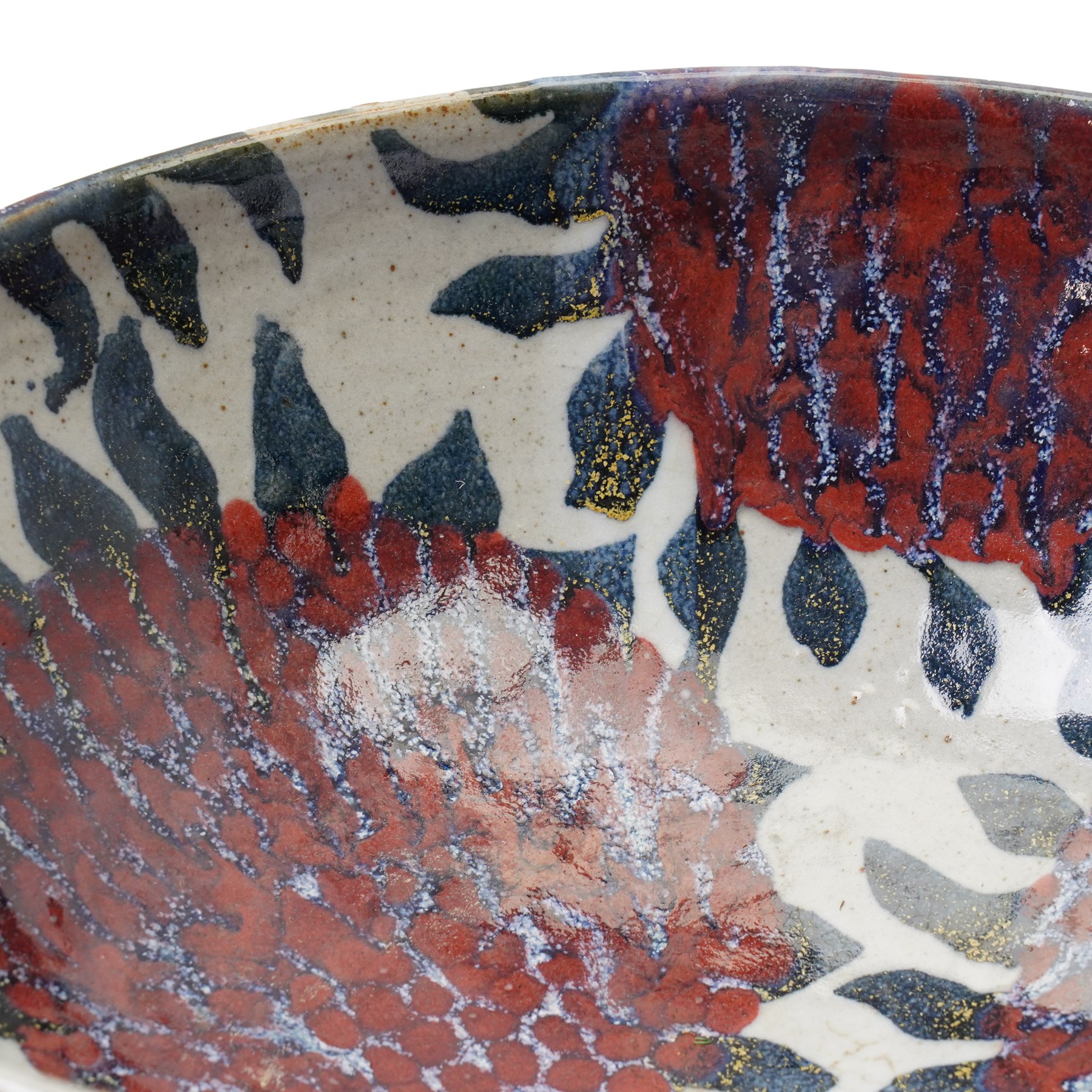 Sophie Hamilton (1963-): Sunflower bowl, decorated with blue and red sunflowers on a pale ground, unmarked, D34cm