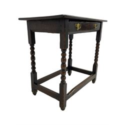 18th century oak low-boy, rectangular two-plank top over a single drawer with pressed brass handle plates, raised on bobbin-turned supports united by box stretcher