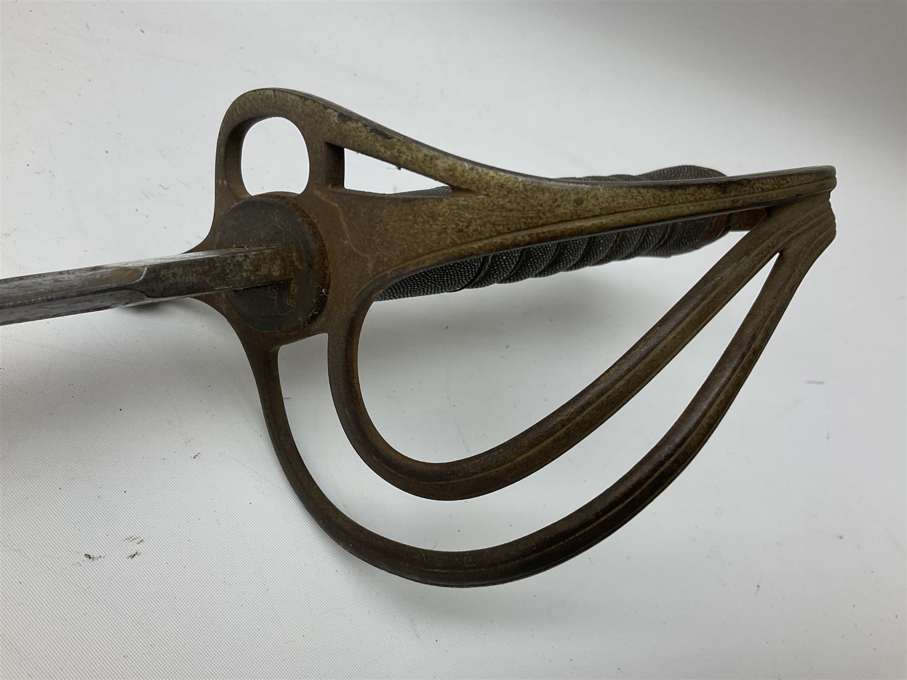 Victorian artillery officer's sword, the 90cm fullered steel blade by E. Thurkle Denmark Street Soho London decorated with Victoria cypher, Regimental crest and 'Royal Artillery', three-bar hilt with stepped pommel and wire-bound fish skin grip; in leather covered scabbard L107cm overall