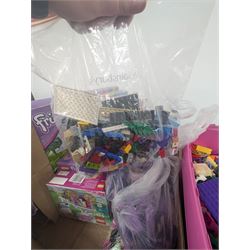 Lego Friends no. 3189 Stables set, Lego Trolls no. 41252 World Tour set, The Lego Movie set no. 70825, three small Lego Friends sets, all boxed and a quantity of loose Lego, including purple and pink colourways