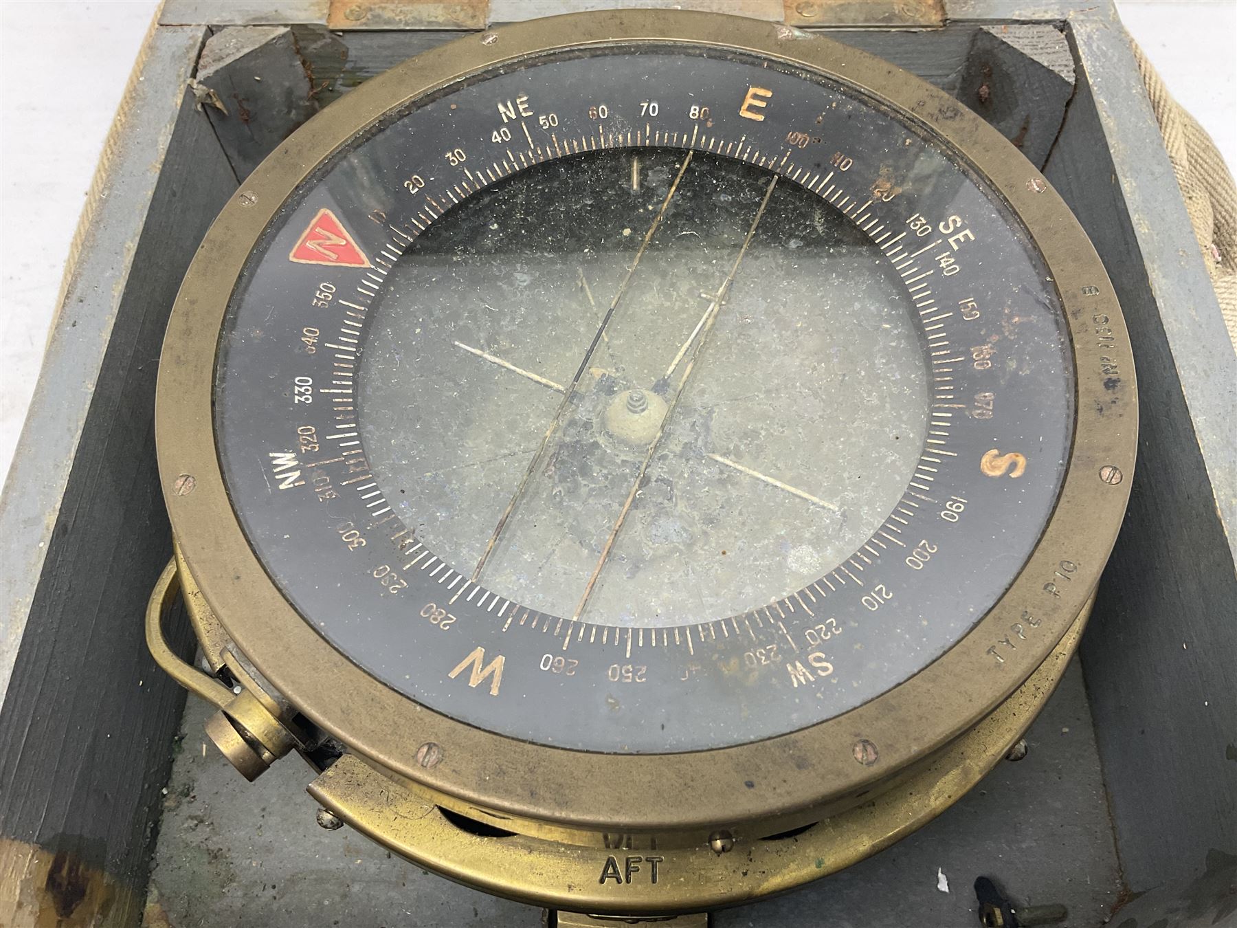  WWII period Type P10 aircraft compass, 16.5cm diameter brass rim marked “Type P10” and “No 1130B”, spring mounted onto brass base with Air Ministry plate marked “Crown A.M. No 6A.1671”; in original grey painted wooden box