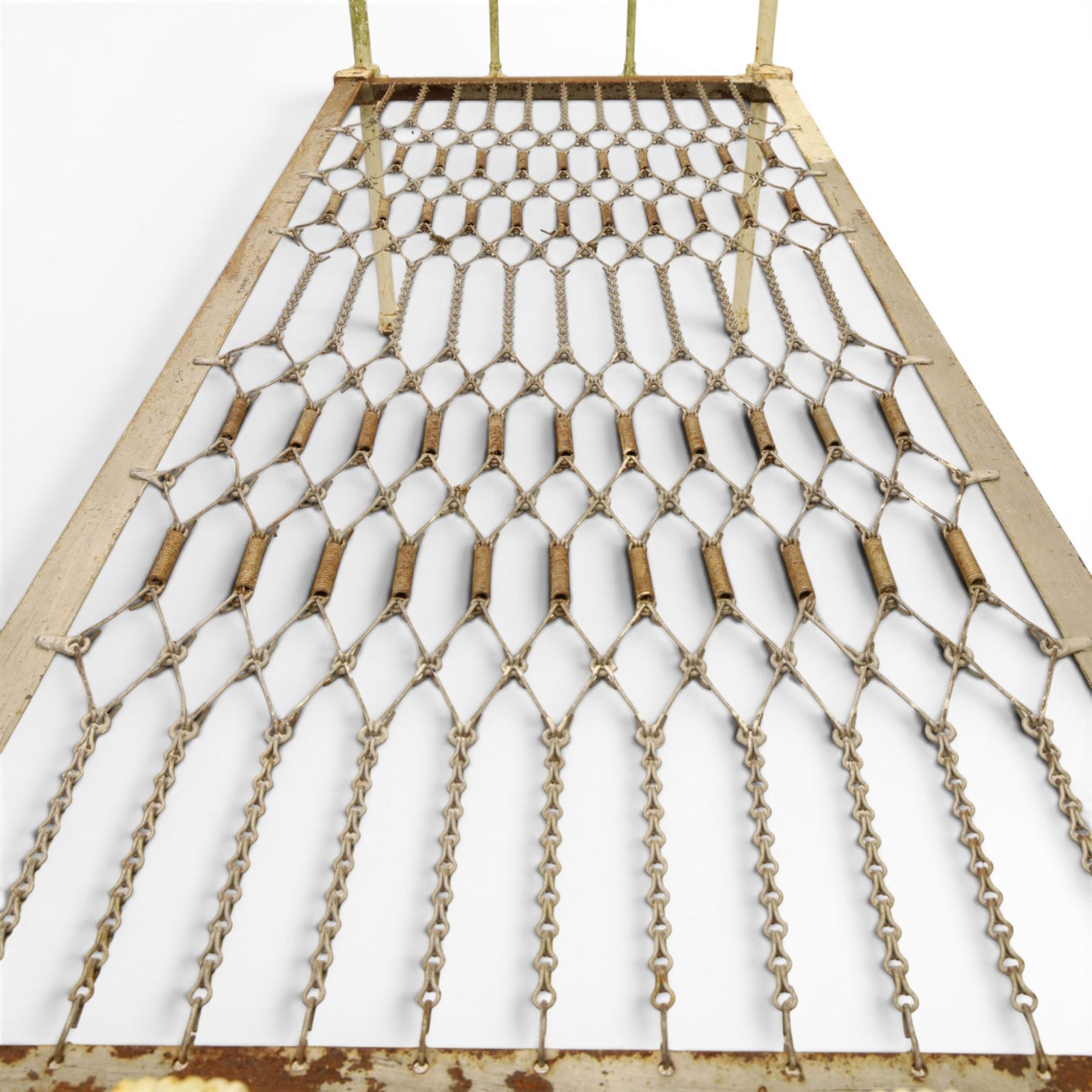 19th century wrought iron single bed, white frame with knot details, frame with wire and spring supports