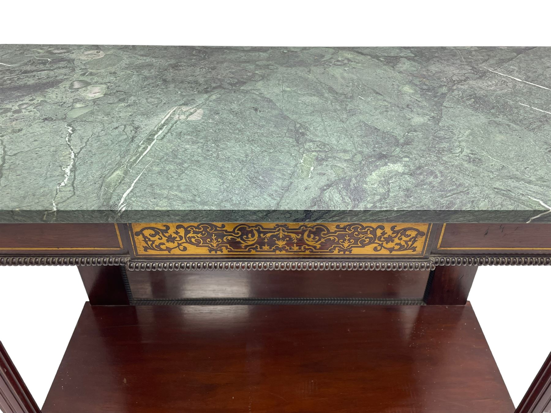 Late 19th century mahogany console or pier table, rectangular green marble top over a break-front frieze inlaid with brass scroll work panels, reed and ribbon gilt metal and wooden beaded applied mouldings, on turned and fluted front supports, plain mirror back over plinth platform base