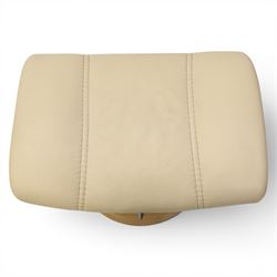 Ekornes - Stressless reclining beige leather armchair and stool, raised on brushed steel frame, light oak rotating base
