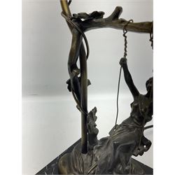 Art Nouveau style lamp in the form of a woman on a swing, with a green mottled shade, upon a marble base H52cm