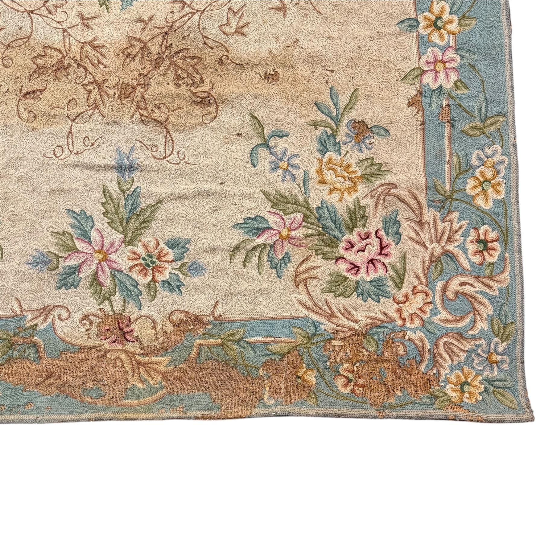 Two early 20th century Kashmiri cyan ground crewelworks 