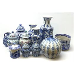 A selection of blue and white ceramics, to include a garden seat, Spode planter, Spode tea caddy, and various urns and covers and vases with Oriental style decoration. 