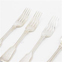 Five Victorian silver Fiddle pattern table forks, all engraved with crest to terminal, hallmarked The Portland Co, London 1861