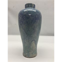 Holyrood Pottery vase of bulbous form decorated in a mottled and streaked green and blue glaze, with printed mark beneath, H24cm