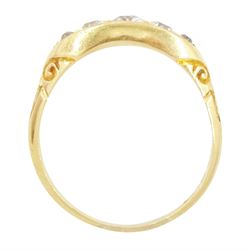 Early 20th century 18ct gold five stone diamond ring, set with five graduating old cut diamonds, with scroll design shoulders, hallmarked, total diamond weight approx 0.60 carat