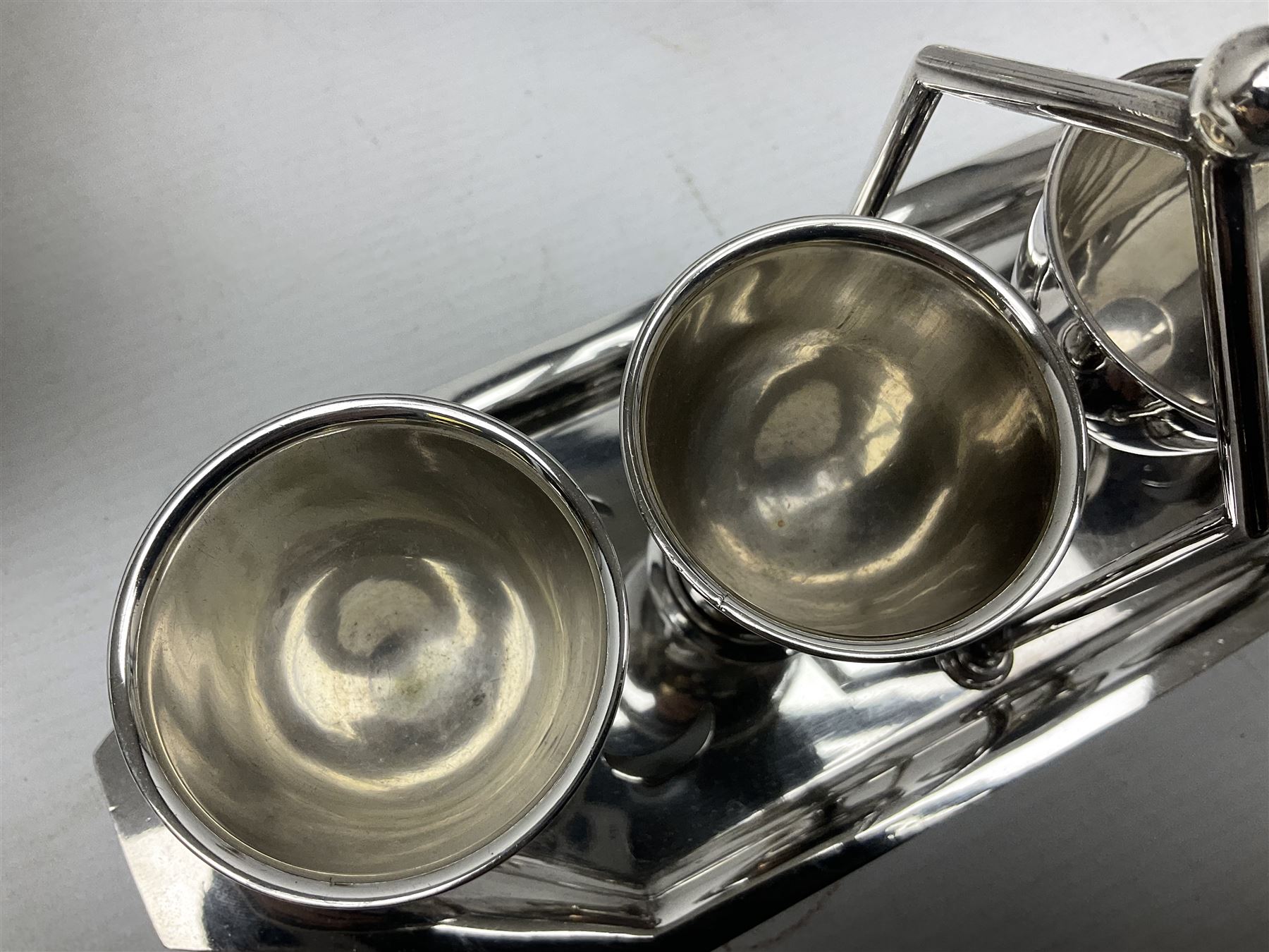 Collection of assorted silver plate, comprising four cup egg cruet, table lamp, bud vase, desk stand etc  