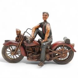 Painted resin model of a figure on a Harley Davidson motorbike, W50cm