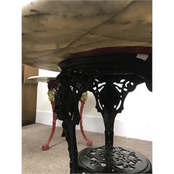 Pair cast iron Britannia pub tables, one red, one black with large marble tops 