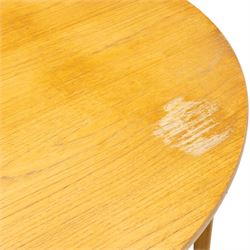 Sutcliffe of Todmorden - mid 20th century ‘S-Form’ teak dining table and chairs, the circular storable extending table with plain veneered top on tapered supports, together with matching dining chairs upholstered in black vinyl, with curved slat backs and shaped front supports, reflecting the sleek organic styling characteristic of 1960s British modern furniture design (Chairs H 93cm, W 46cm, D 46cm) (Extended 168cm)