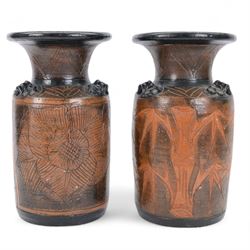 Two studio pottery vase, of matching form, one decorated with bamboo, the other with a rose, H42cm