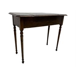 Edwardian oak metamorphic 'Britisher Writing Table', rectangular hinged top revealing correspondence compartments and hinged writing surface with underside storage, flanked by twin hinged compartments with dividers, on turned supports