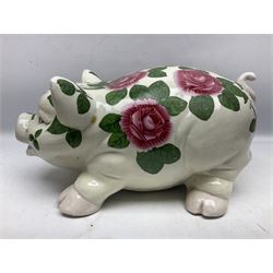 Large ceramic figure of a pig decorated with roses, L45cm