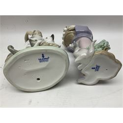 Five Lladro figures, including The Lamp Lighter no 5205,  Girl and Kittens no 6102, Cat no 5113 etc