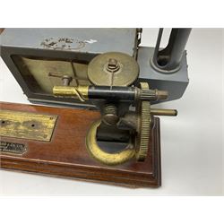 Collection of textile equipment, comprising, Goodbrand & Co. mahogany and brass yarn tester, Negretti & Zambra barograph and two sets of precision scales