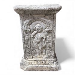 Paid of square cast stone plinths with a classical design