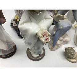 Eight Lladro figures, comprising Japanese with Fan no 4991, Michiko no 1447, Playing Flute no 6151, Bearing Flowers no 6151, Sunning no 1481, Baby Jesus no 4535, Starlight Starbright no 1476 and Serene Moment no 5550.3, largest example H28cm 