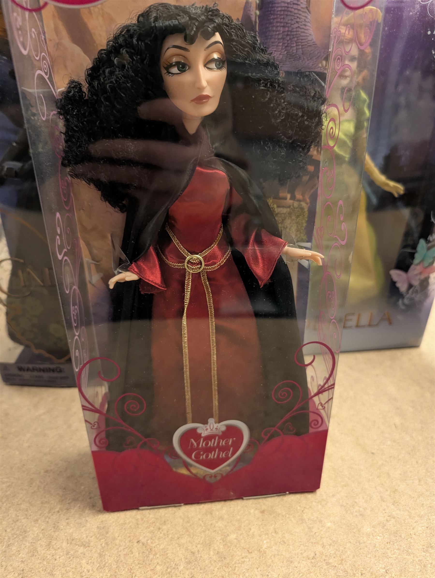 Five Disney Dolls, comprising Mattel Lady Tremaine, and The Disney Store Ursula, Mother Gothel, Hans and Lady Tremaine, all boxed