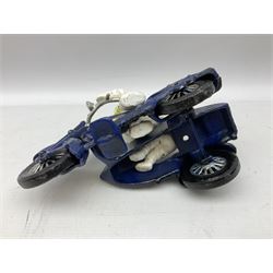 Cast iron figure of Michelin Man on motorbike modelled with smaller seated Michelin man in sidecar, H16cm