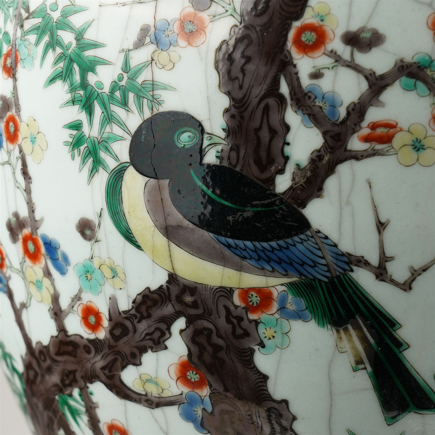 Late 19th century Chinese famille verte crackled ice pot and cover, of ovoid form, decorated with birds, blossom and bamboo, the cover with handle formed as a root, with hardwood display stand H50cm