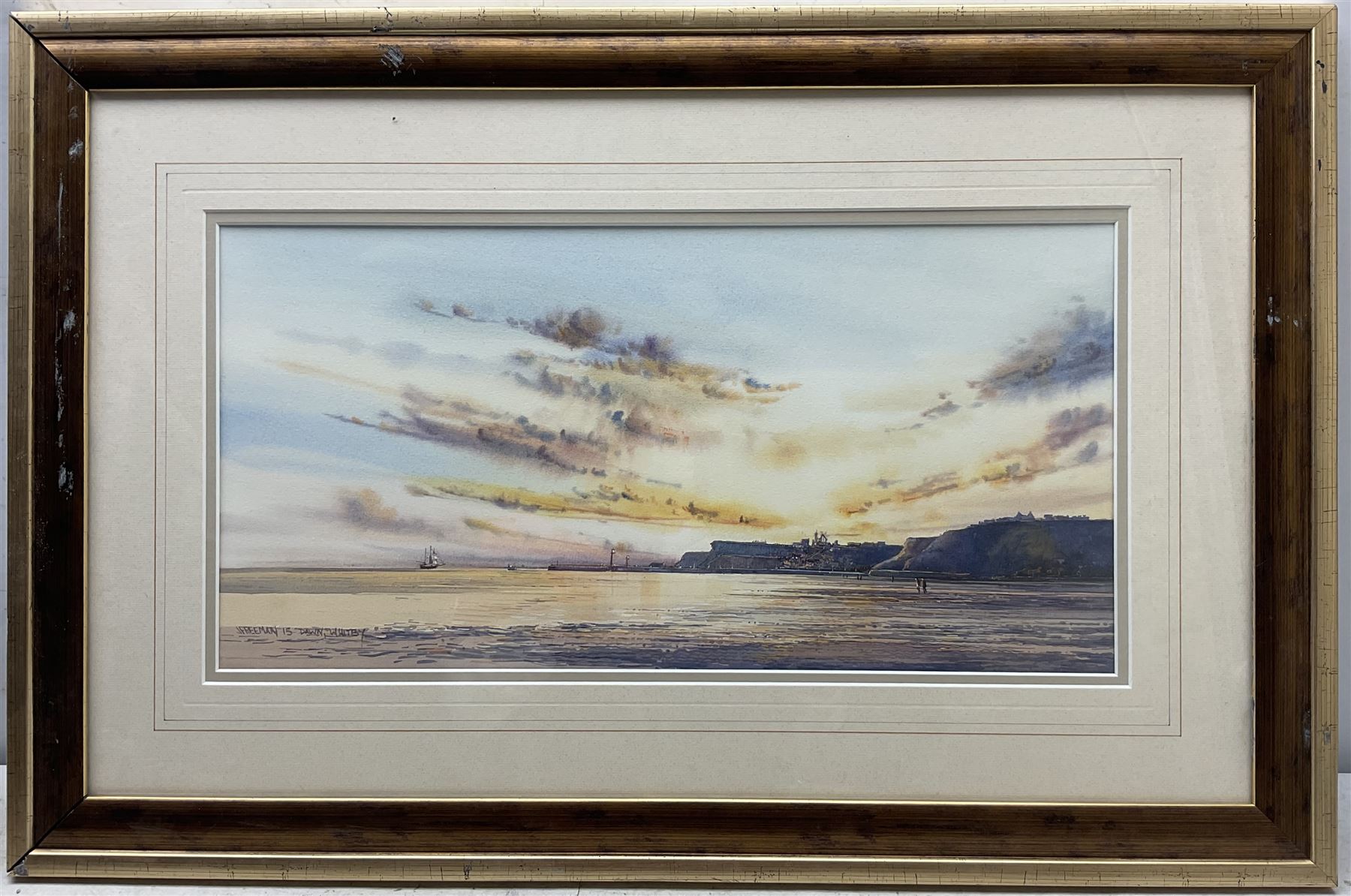 John Freeman (British 1942-): ‘Dawn - Whitby’, watercolour signed titled and dated ‘15, 25cm x 50cm
