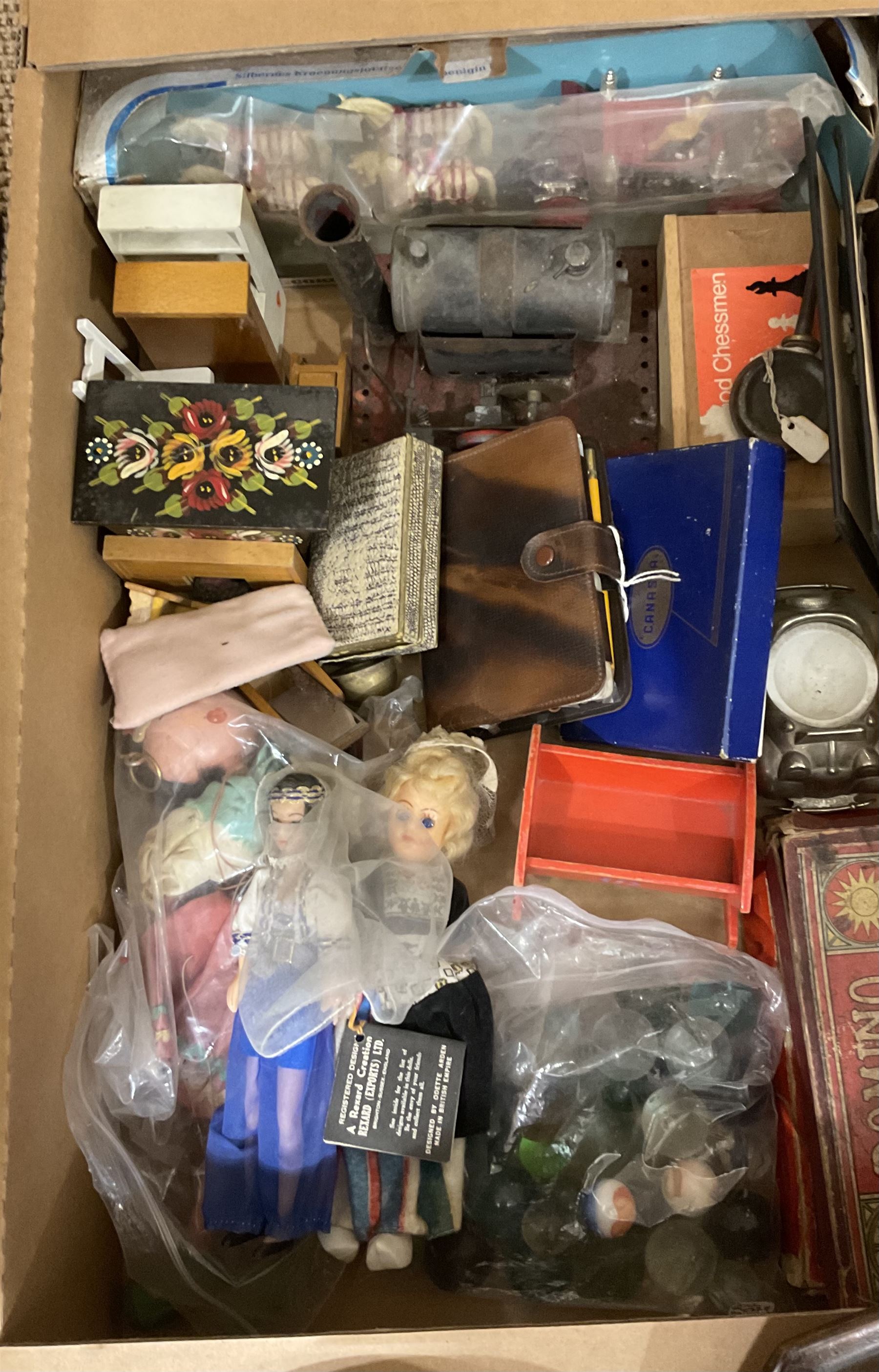 Wood chess board with inlaid detail, quantity of glass marbles, static steam engine, dolls house furniture, other games and toys etc in one box