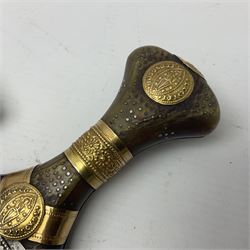 Eastern Jambiya, the 20cm double edge steel blade with raised medial ridge, waisted grip with pique work; in leather scabbard with jewelled white metal decoration 