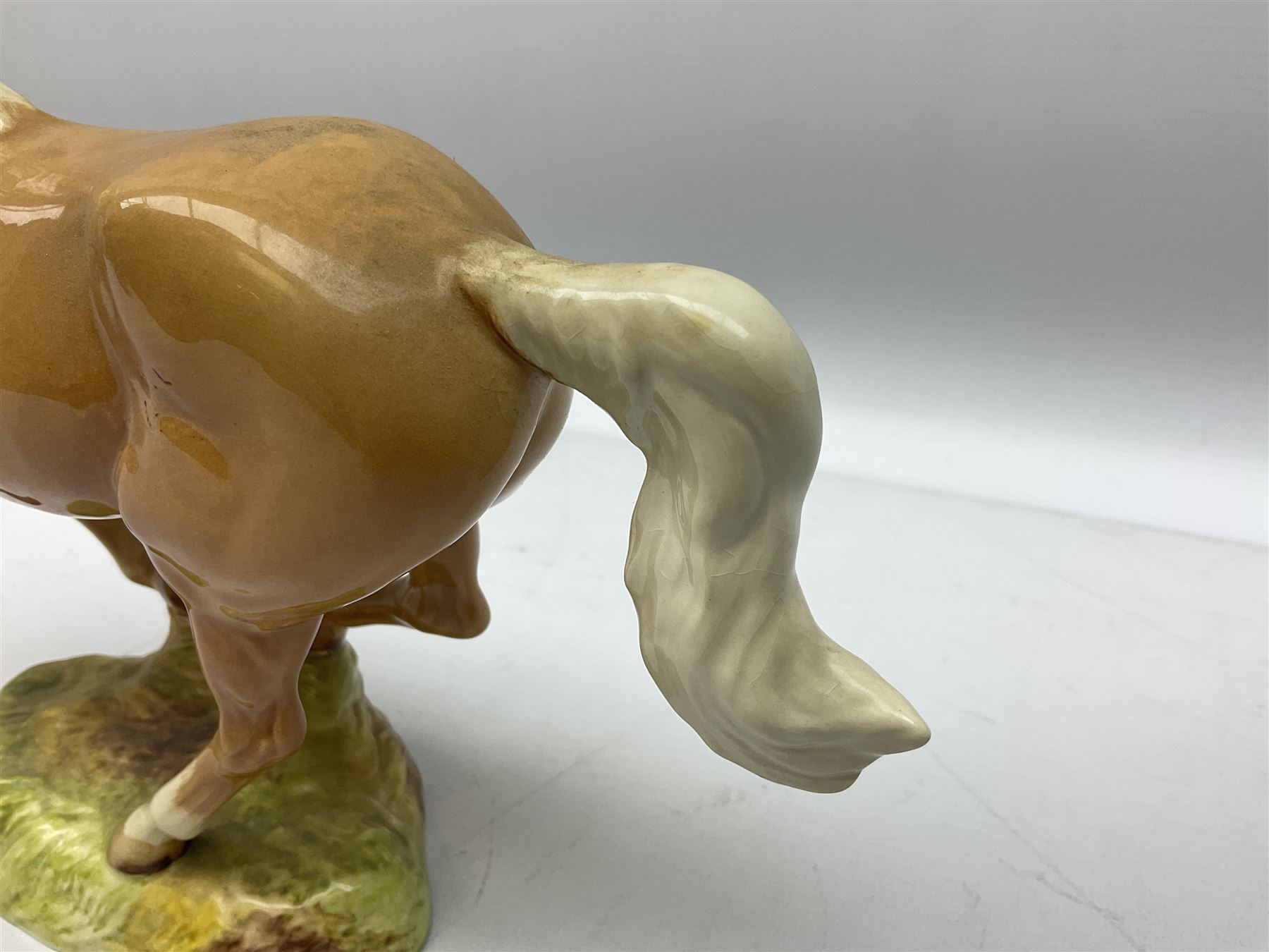 Beswick figure of cantering Palomino horse on base model no 1374, with impressed and printed mark beneath, H18cm