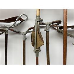 Adjustable Gamebird shooting stick, together with Mills Munitions shooting stick, Featherwate shooting stick, five others and two wooden walking sticks.  