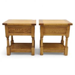 Old Charm - ‘Chatsworth’ pair of light oak lamp tables, each with moulded rectangular top, single drawer and metal drop handle, raised on turned supports joined by undertier shelves