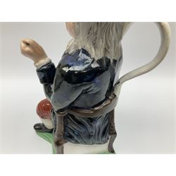 Early 20th century Staffordshire William Kent Squire toby jug, modelled seated upon a corner chair holding a jug of ale in his right hand, H28cm