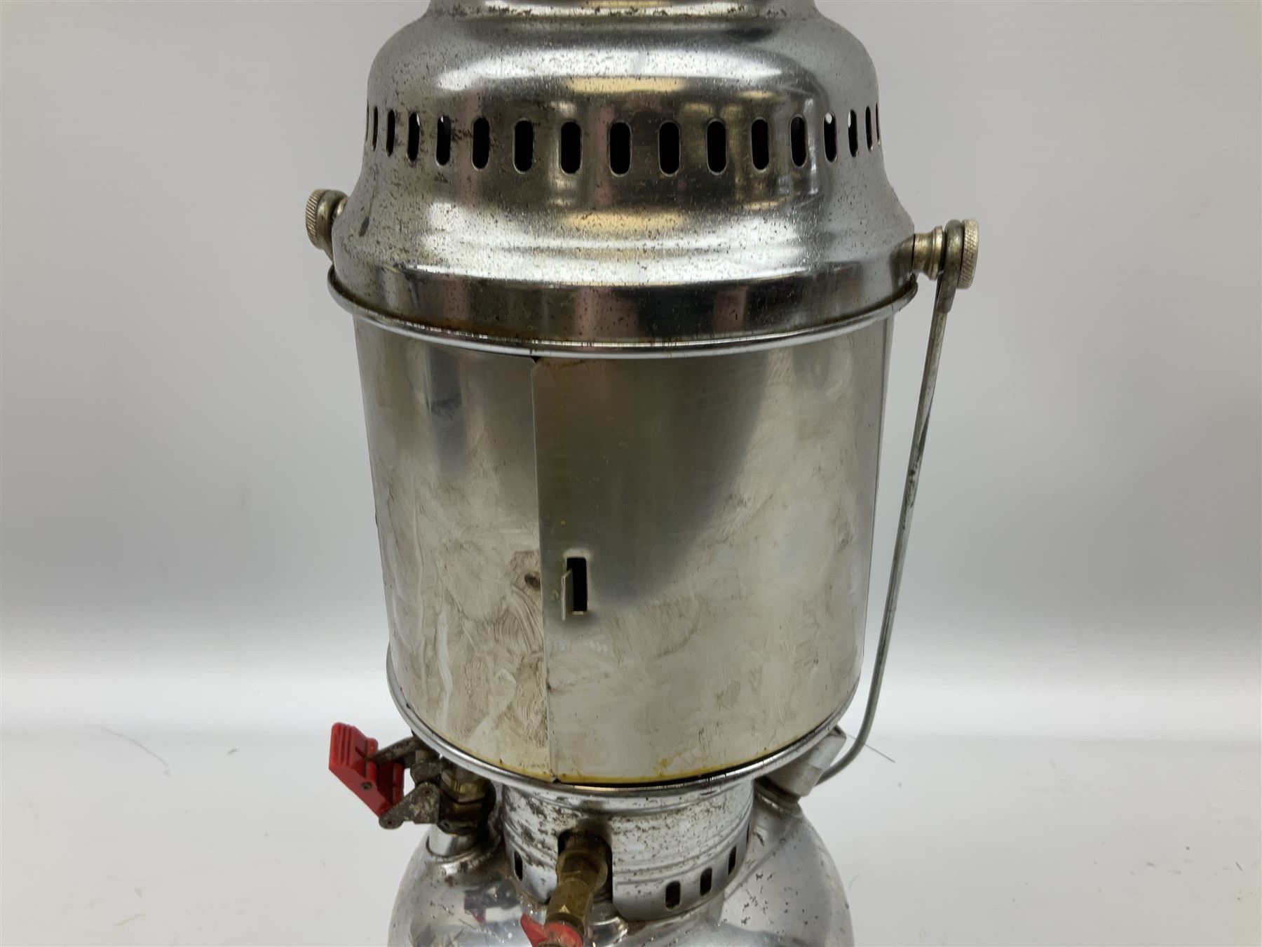 Copper and brass ship’s lamp marked ‘Anchor’, H25cm, Feuer hand storm lantern, Bialaddin Model 315 paraffin lamp and an Anchor lamp (4)