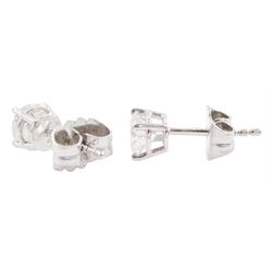 Pair of platinum round brilliant cut diamond stud earrings, hallmarked, total diamond weight approx 1.40 carat