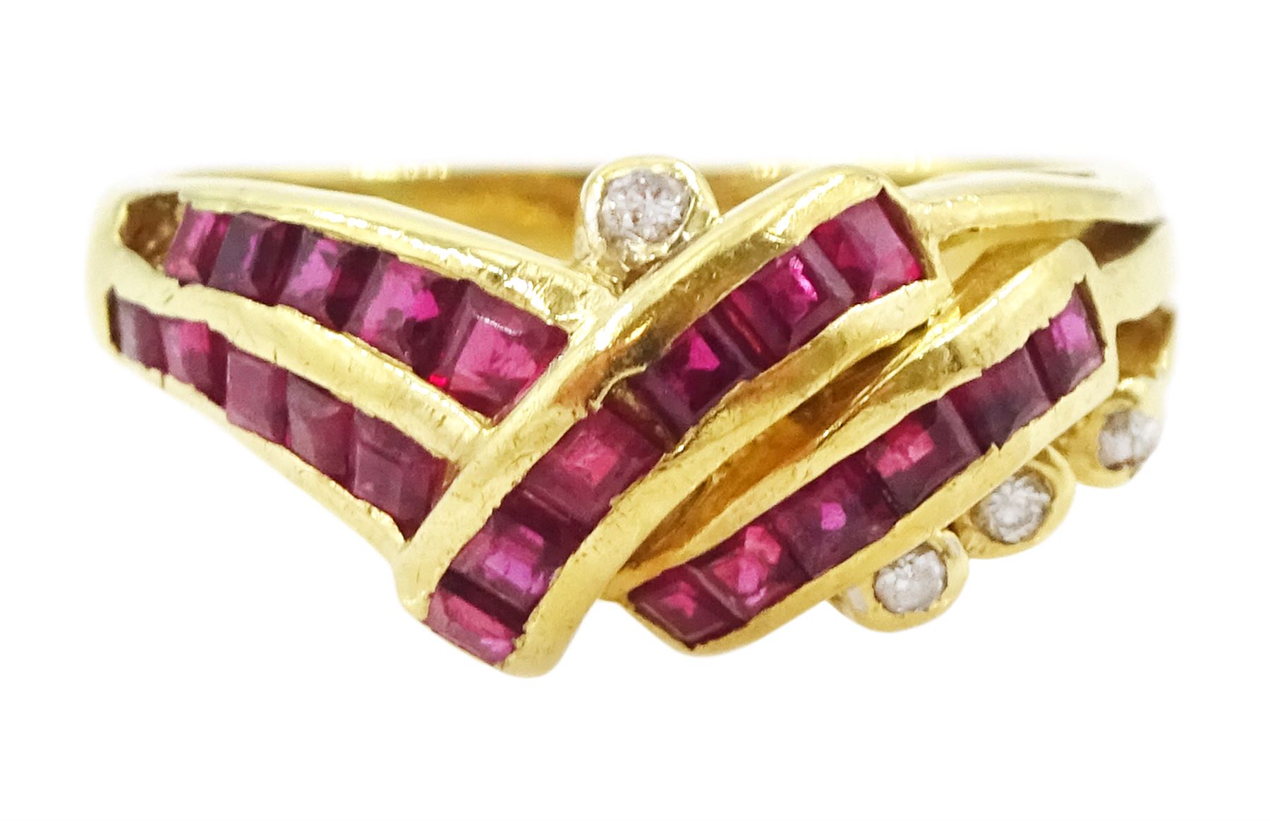 18ct gold channel set, calibre cut ruby and round brilliant cut diamond crossover ring, stamped 750