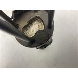 Art Deco style bronze figure of a lady seated on a stool applying lipstick, after Dimetri H Chiparus, with foundry mark, H28cm