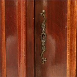 Victorian design mahogany corner cabinet, shaped carved cresting above bowed glazed upper door, with panelled side uprights, lower drawer over cupboard door decorated with floral marquetry, on plinth base