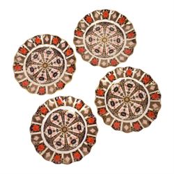 Four Royal Crown Derby Old Imari 1128 pattern fluted dessert plates, D21cm
