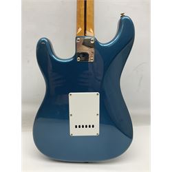 Fender Stratocaster style electric guitar in metallic blue with Rio Grande pick-ups and Fender back-plate L98cm; in Fender soft carrying case