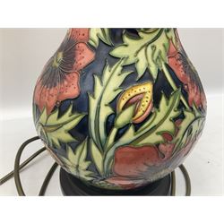 Moorcroft table lamp of baluster form, decorated in the Pheasant's eye pattern designed by Shirley Hayes, with Moorcroft cream fabric shade with yellow, green and pink piping, overall H61cm