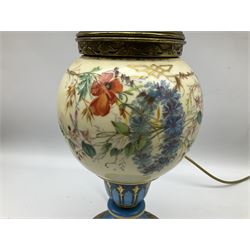 20th century continental, probably French, hand painted ceramic and brass table lamp decorated with flowers and gilt detail upon a footed base, H62.5