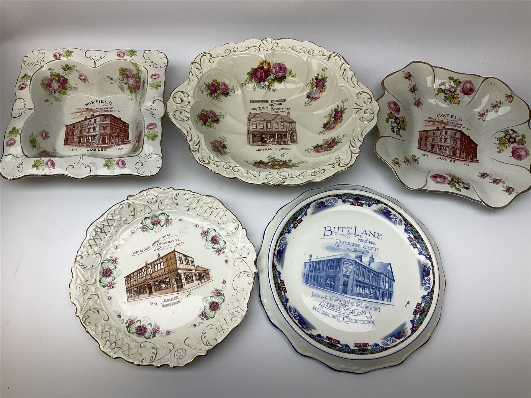 Two Royal Crown Derby pattern Imari soup bowls, pattern 2451, Belleek Fermanagh Ireland four piece set in green shamrock pattern, Royal Doulton small lady figure, Marie HN1370, large Wedgwood fruit bowl, Sylvac jardiniere in autumn leaves pattern, five pieces Co-operative Society commemorative ceramics, with selection of other ceramics. 