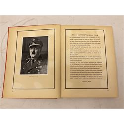 Adolf Hitler, Bilder aus dem Leben des Fuhrers [Pictures from the Life of the Fuhrer], Herausgegeben vom Cigaretten / Bilderdienst, Hamburg / Bahrenfeld, 1936, an album of two hundred tipped-in cards bearing photographs by Heinrich Hoffman, originally collected with cigarettes, 31 cm x 24 cm; together with a Waffen-SS book 'Wenn alle Bruder schweigen'; Hamburg 1939-1945; and two other booklets